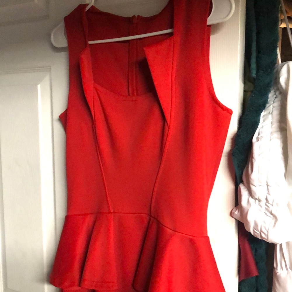 Non brand red dress I am a medium and fits well stretching material